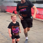 Hugo running with his Dad for Adoption Matters