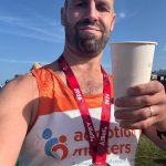 Dan showing off his completion medal.