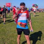 Dave posing with his completion medal.